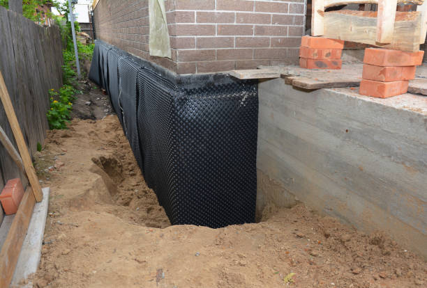 SJ Waterproofing Pros technician performing targeted Foundation Crack Repair assessment in East Brunswick, NJ